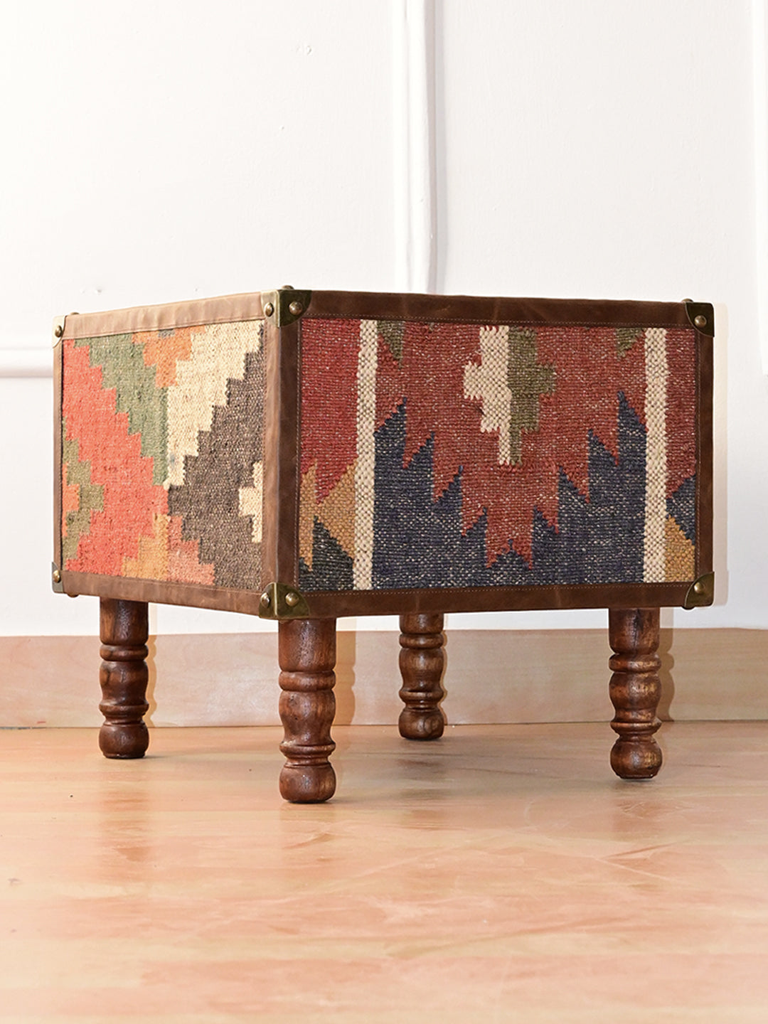 Rear three-quarter view of the Mahansar bedside table, kilim on the back and side