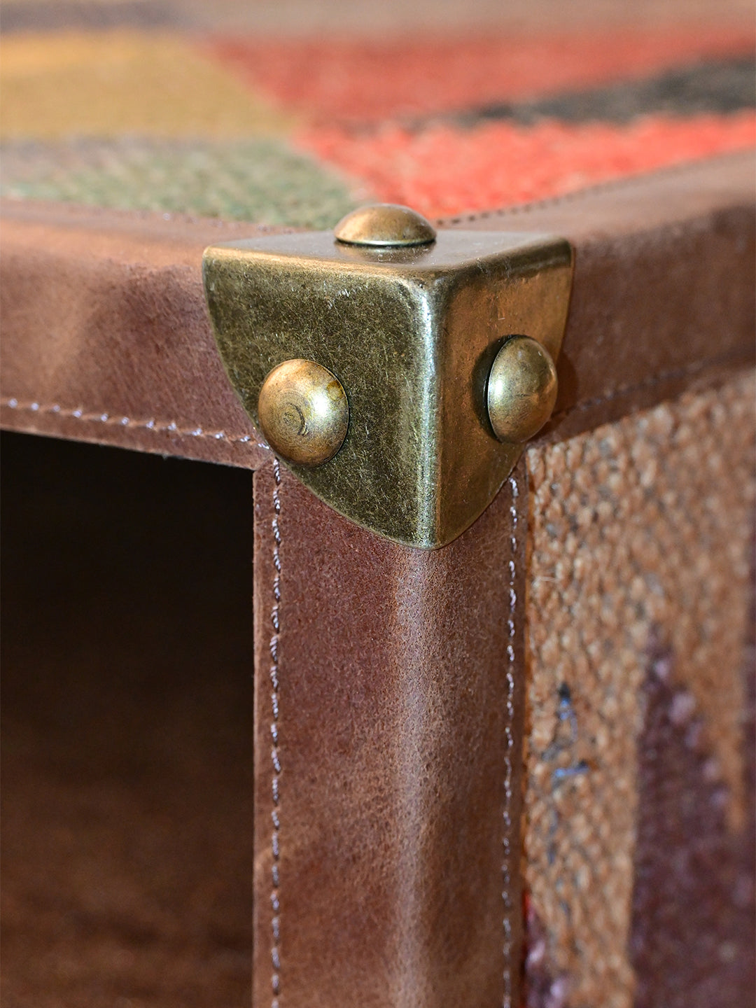 Mahansar kilim bedside table styled in front of a kilim-framed mirror, Art Avenue
