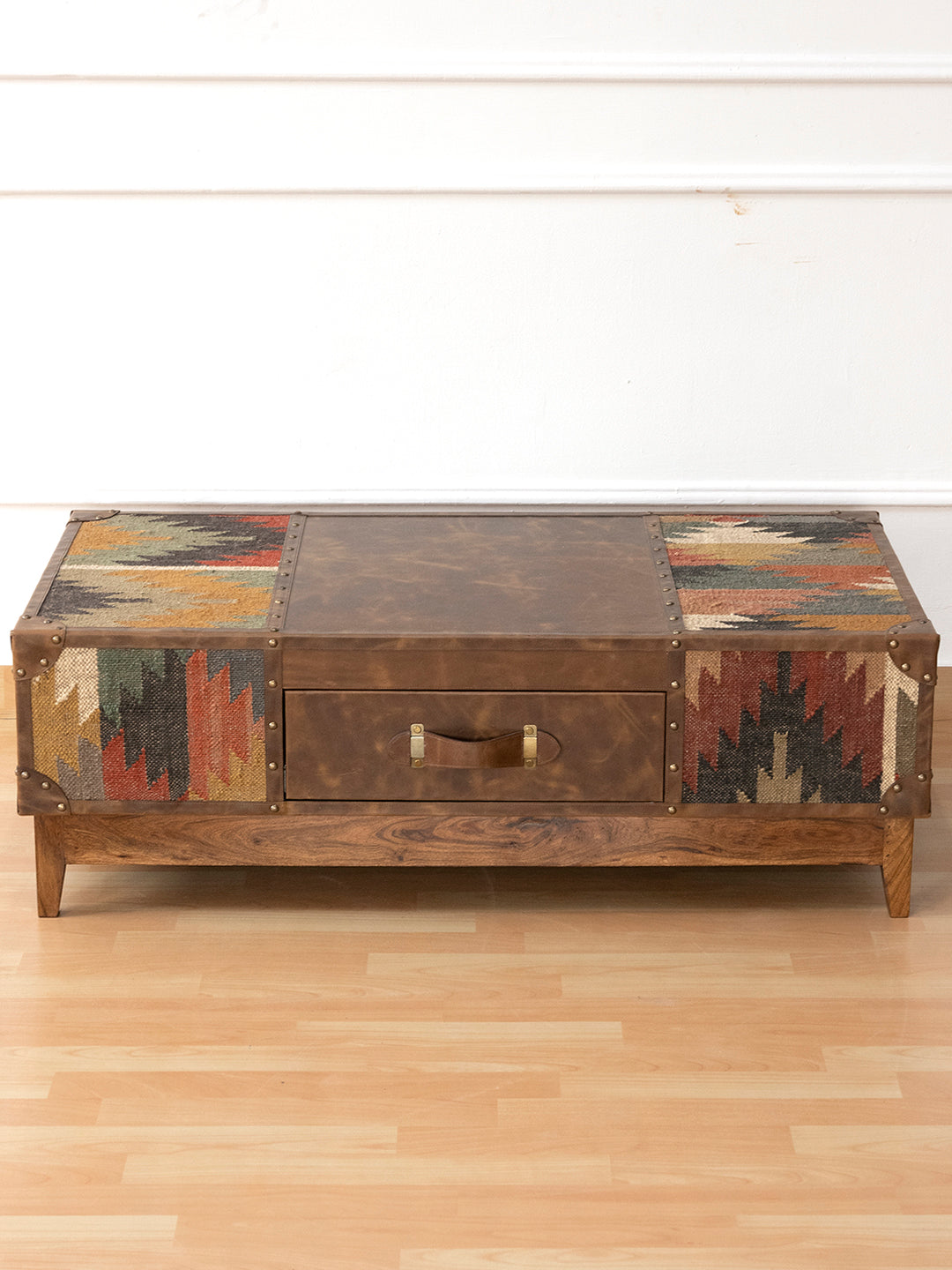 Sojat kilim and leather coffee table by Art Avenue, raised front view showing the three-panel top