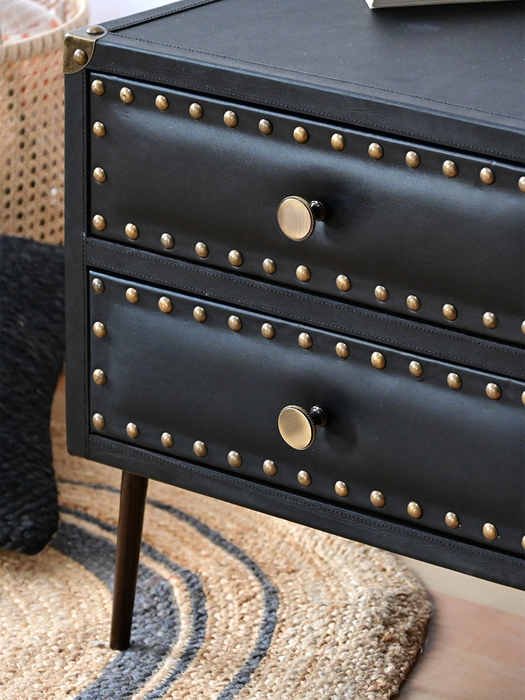 Close view of padded, studded Onyx leather drawer fronts, Kishangarh bedside table, Art Avenue