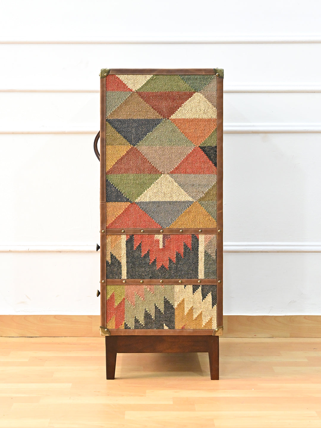 Side elevation of the Shalimar cabinet, vintage kilim across the full height of the flank — Art Avenue, made to order
