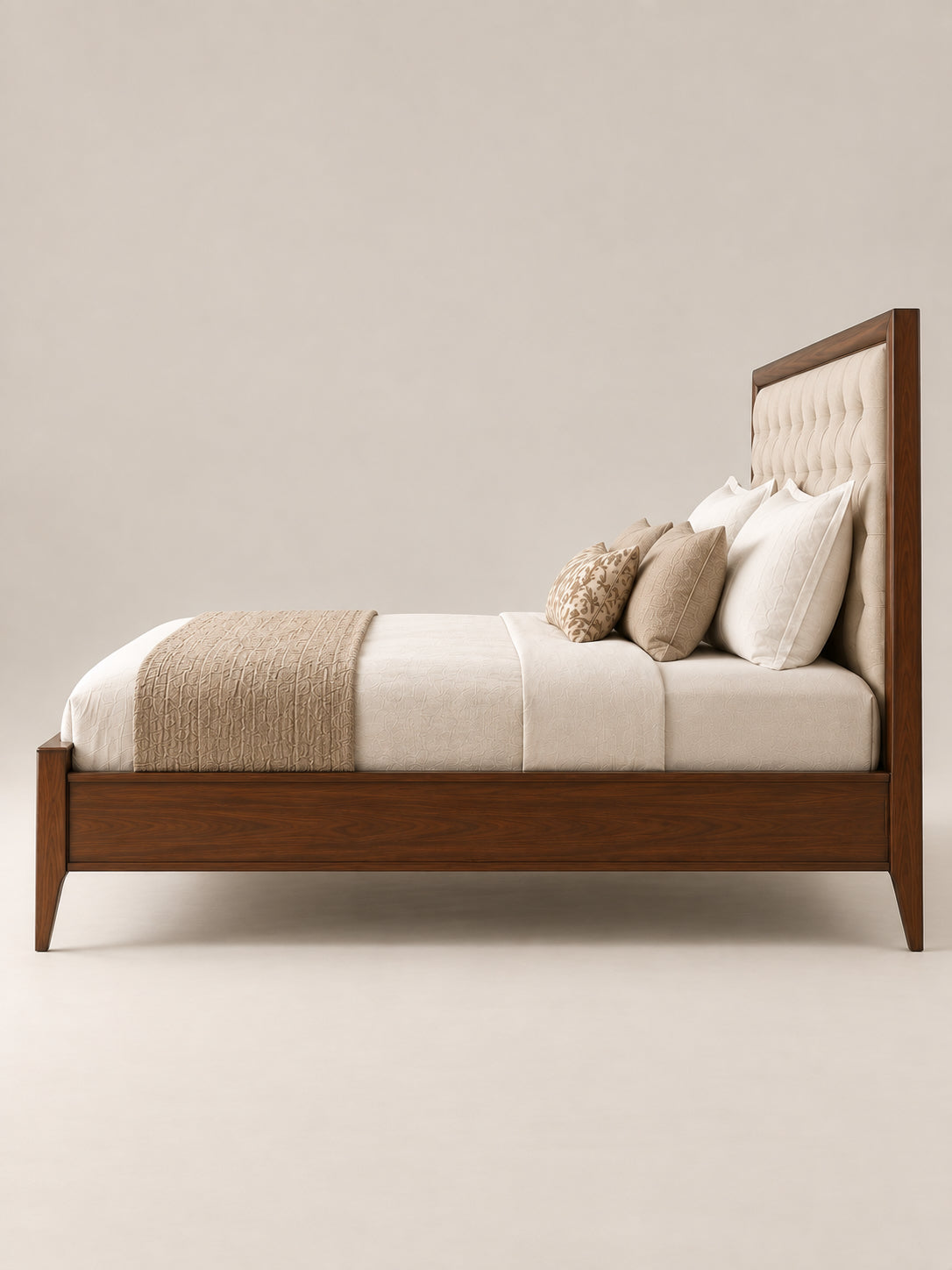 Landour Tufted Upholstered Bed in side profile — 137 cm buttoned headboard, plain panelled side rail and slightly splayed square tapered legs in Walnut. Art Avenue, made to order.