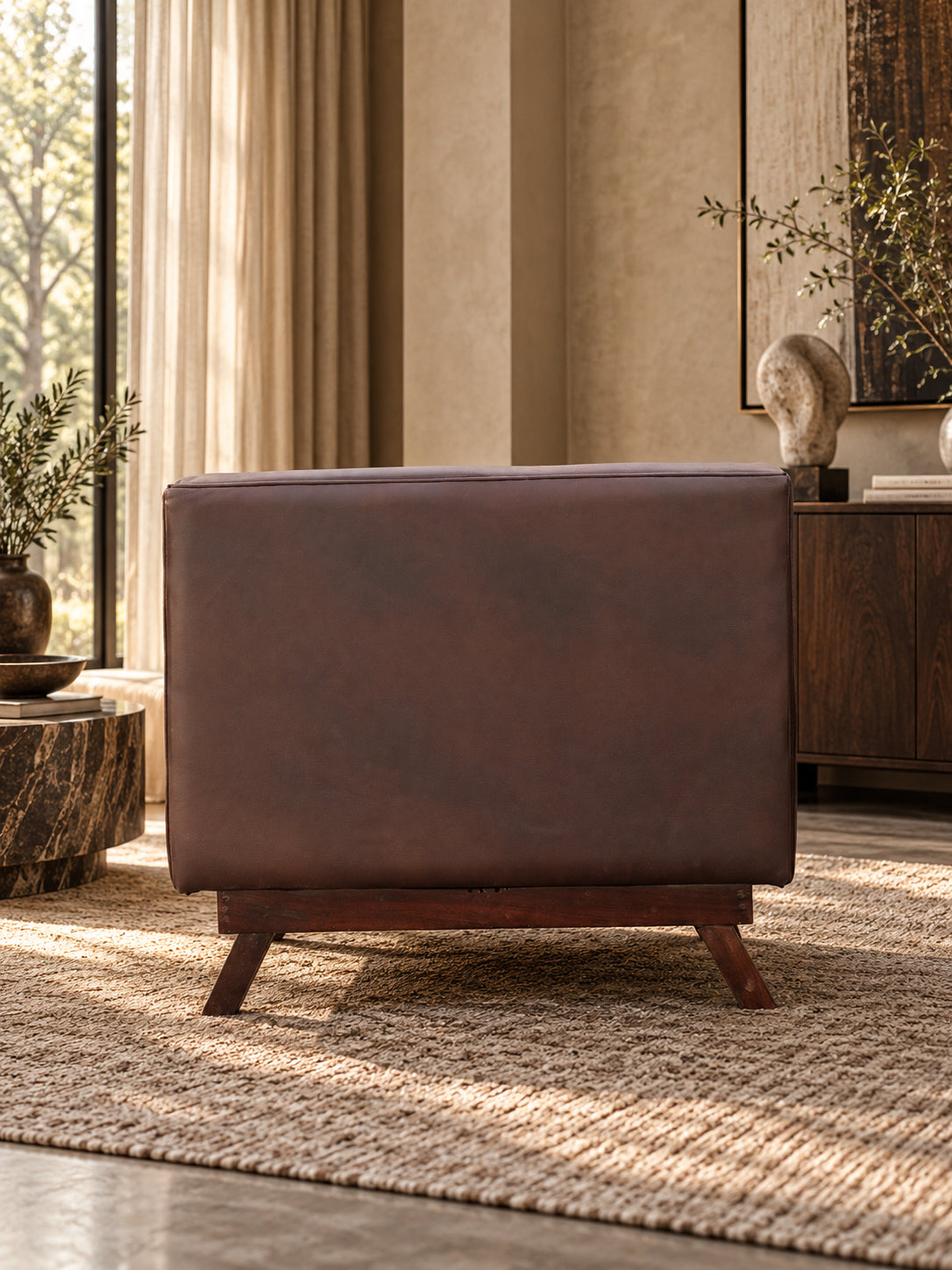 Chail buttoned leather club chair in Espresso leather with walnut legs, deep-buttoned back and inside arms, angled three-quarter view — Art Avenue, made to order